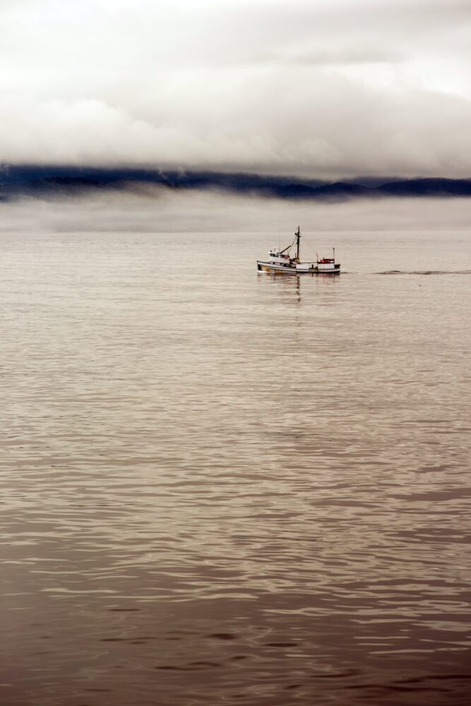 Lone Fishing Boat Motors Out Strait Heading to See