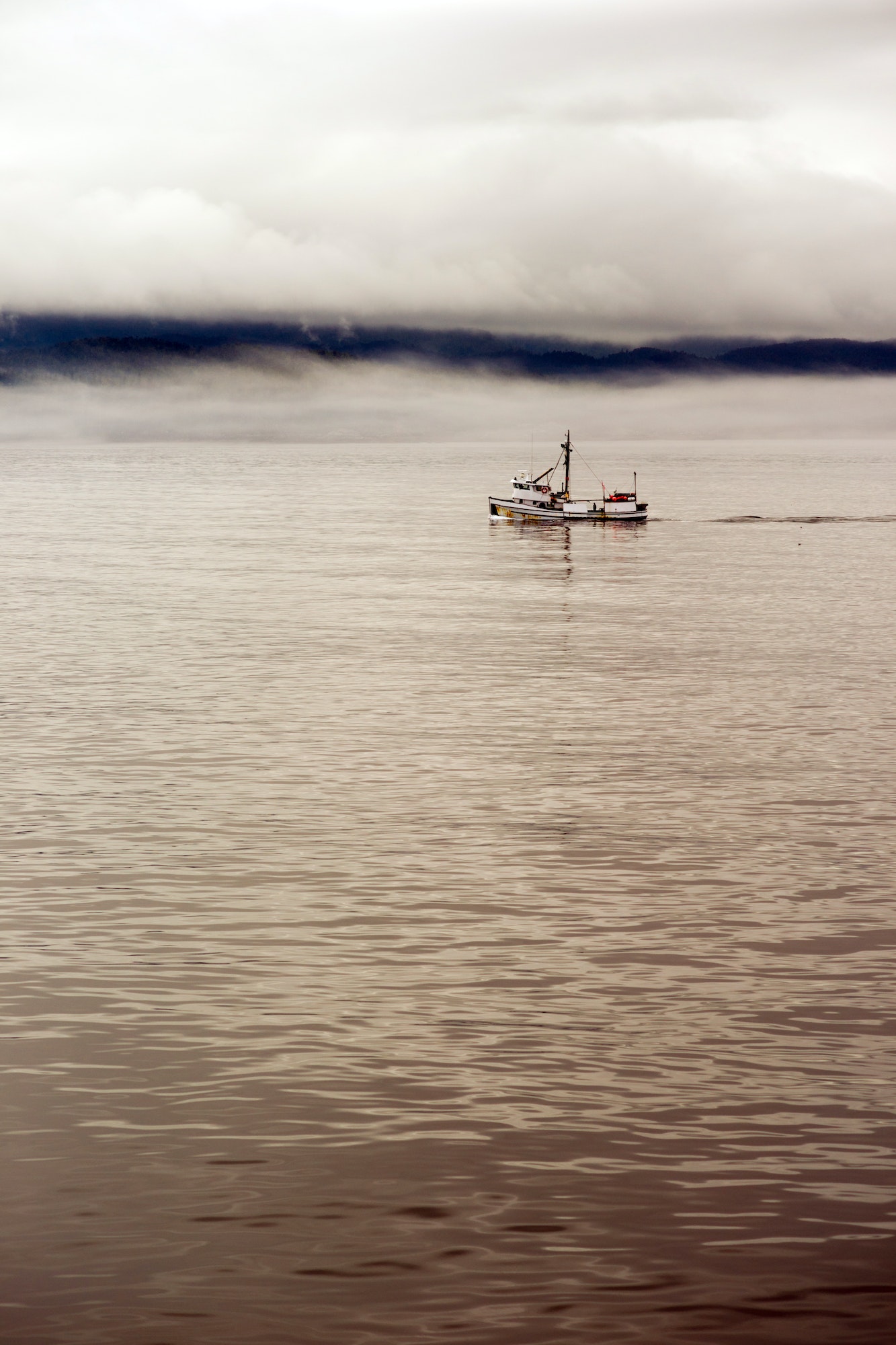 Lone Fishing Boat Motors Out Strait Heading to See